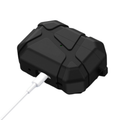 A rugged black electronic device with a textured, protective casing, shown with a white charging cable plugged into one of its ports against a white background.